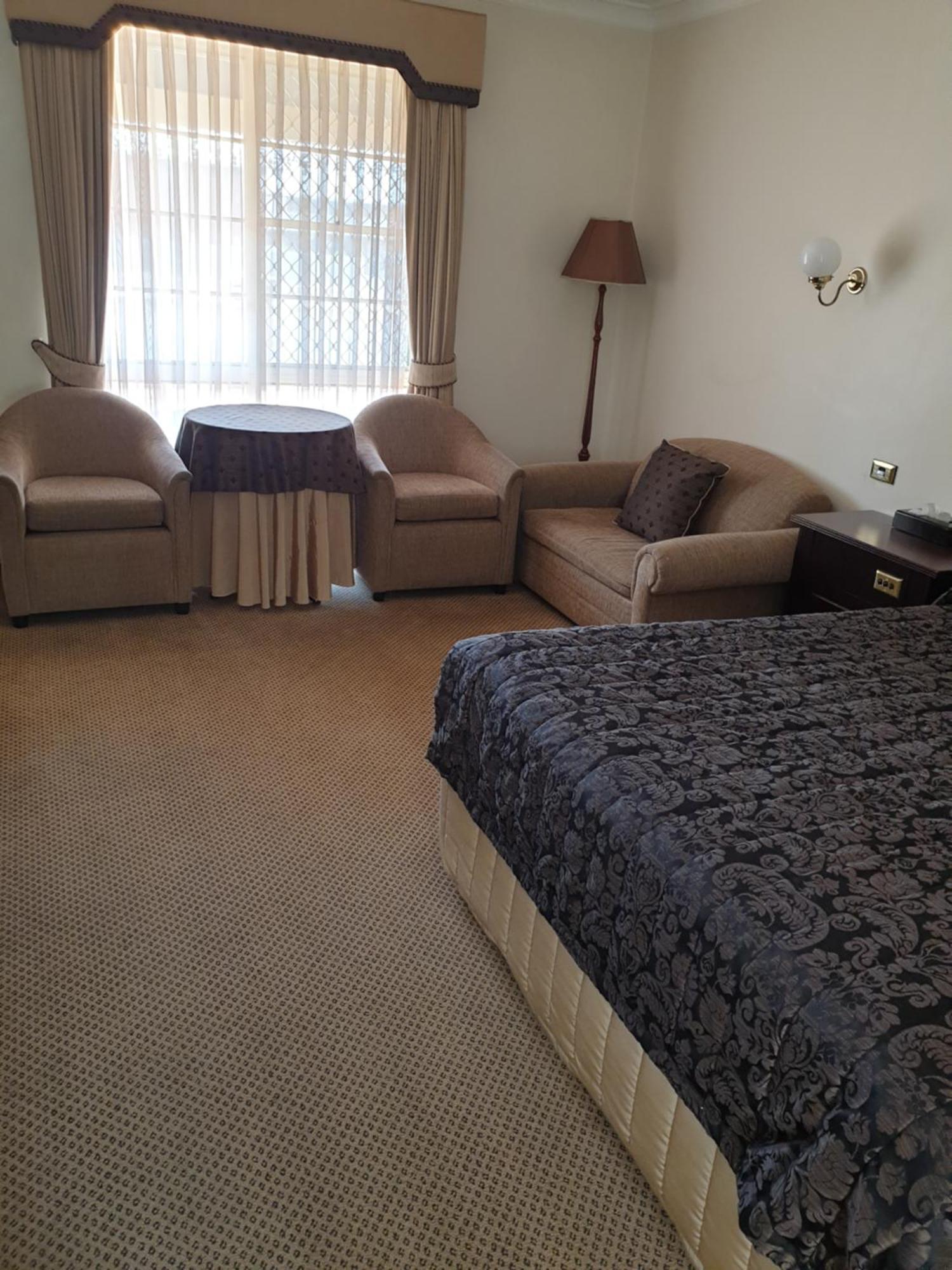 דובו Australian Heritage Motor Inn חדר תמונה